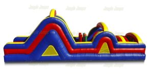 inflatable obstacle course with inflated tubes making you push thorugh or crawl over with a slide at the end