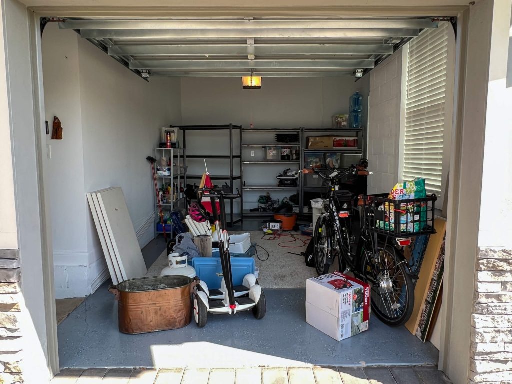 florida garage with miscellaneous junk in it, 2023 complete cleanout guide